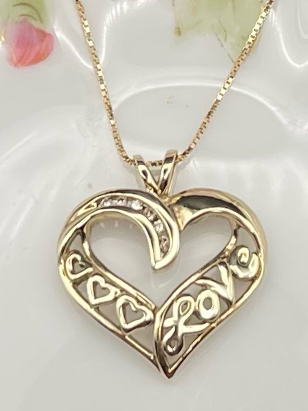 Estate piece, 14k yellow gold diamond LOVE love open heart necklace